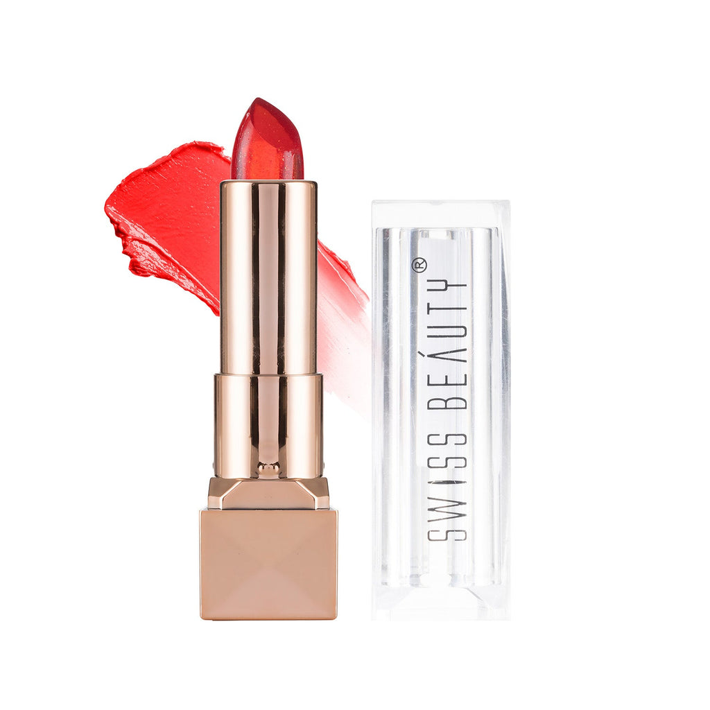 Red lipstick with rose gold casing and 'Swiss Beauty' case on white background